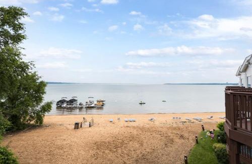 Traverse City House | Beach 321 with Vaulted Ceilings Pool Hot Tub and Stunning Views from Private Deck