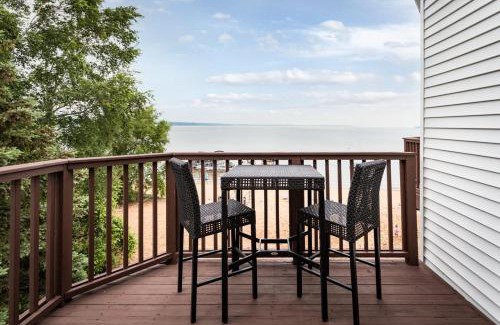 Traverse City House | Beach 321 with Vaulted Ceilings Pool Hot Tub and Stunning Views from Private Deck