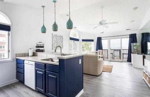 Traverse City House | Beach 321 with Vaulted Ceilings Pool Hot Tub and Stunning Views from Private Deck