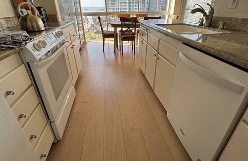 Coronado Condo | Beach and city views in condo with backyard access to beach and walkable town.
