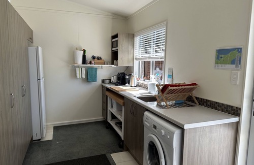 Kuaotunu Cottage | "Beach Baby" Cottage is a 3 min flat walk to the long sandy beach. Fab swimming