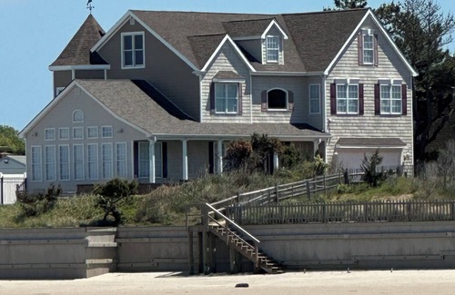 Villas House | “Beach by day, sunset by night.” Pool any time, waterfront & beach front