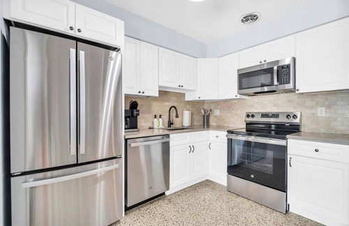 Indian Rocks Beach House | Beach Cottage Pool Spa Golf Cart Pet-Friendly