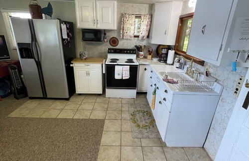 Mecosta Cottage | Beach Front Cottage On Family Friendly Pretty Lake. Sunsets, Fishing And Fun!