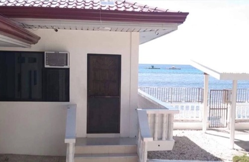 Oslob Apartment | Beach front Studio Unit Pet friendly Big yard and cottage