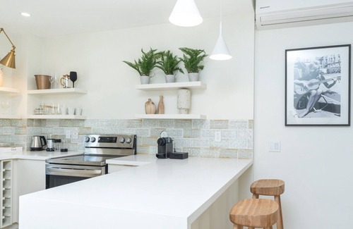 Schooner Bay Apartment | "Beach Happy" Beachfront Apartment by One Caribbean Estates