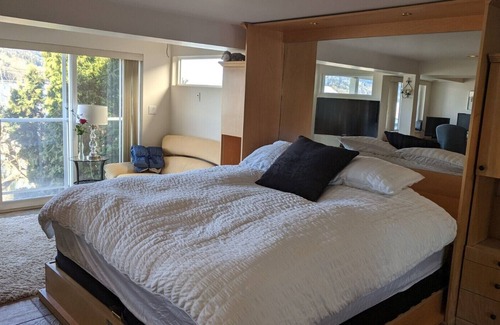 Port Moody House | Beach Home waterfront home with dock.