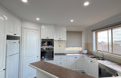 San Remo House | Beach house with water view. Walking distance to amenities . Walk to the beach.