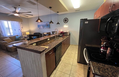 National Gardens Condo | Beach just 7 miles. 1-bedroom condo. King Bed. 75" TV. Granite & Stainless Kit.