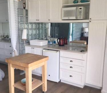 Westwind Apartment | Beach'nBarefoot (Love Beach) - nestled on the beach