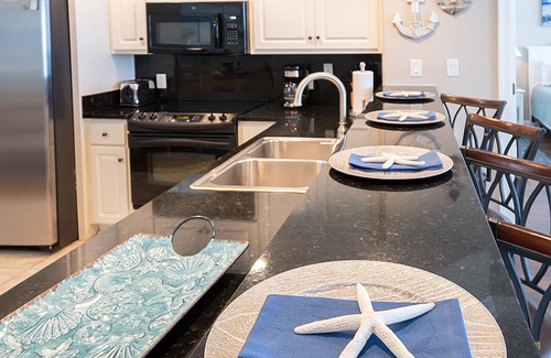 Lower Grand Lagoon Condo | Beach Oasis, Treasure Island, Second Floor! 2BR/2BA , Sleeps 8. Beach chair svc