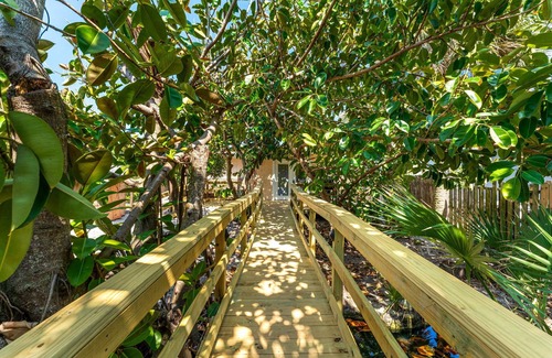 Tropic House | Beach Paradise. Spacious, rustic, charming, original Florida style beach house.