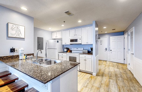 Miramar Beach Condo | Beach resort condo with Gulf view, pool, lazy river, & gym
