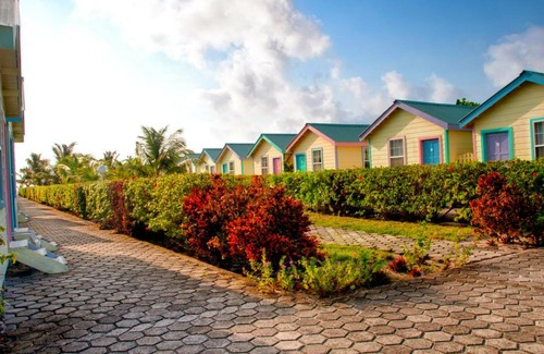San Pedro Cottage | Beach side cottage on Private beach with freshwater pool, "coconut"- RCB