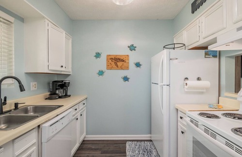 Caswell Beach Condo | Beach Therapy: Oceanfront Condo with Seasonal Community Pool