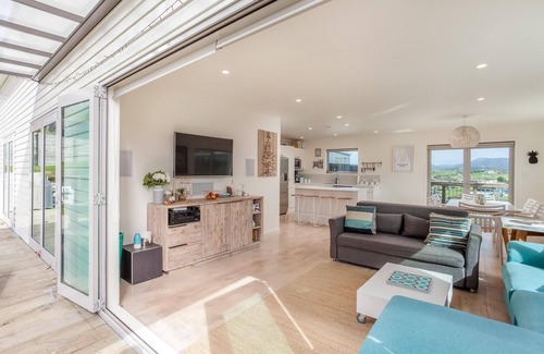 Mangawhai Heads House | Beach Time - Modern, sunny home close to amenities, a great place to relax and watch the kids play