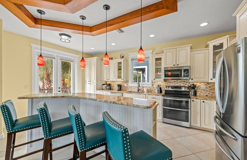 Holmes Beach House | Beach View Retreat! 5BR Home with Pool, Spa, Rooftop Deck and Walk to Beach