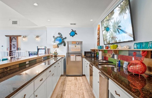 Sand Point House | “Beach Views—Shell Yeah! Beach House is your stylish, fun-filled coastal escape with private bathrooms & neighborhood pool-Just steps from the sand!”