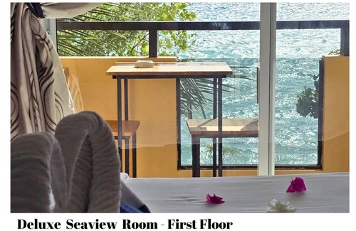 Dhiffushi House | Beach Villa Hotel in Maldives. Just in front of beautiful beach.