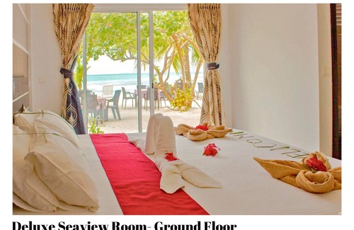 Dhiffushi House | Beach Villa Hotel in Maldives. Just in front of beautiful beach.