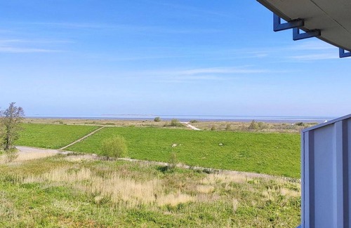 Schillig Apartment | Beachfront 3-room apartment on the North Sea with balcony and sea view - Hus