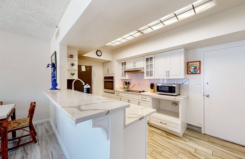 South Patrick Shores Apartment | Beachfront 5th-floor condo with ocean views, balcony & AC - Private beach access
