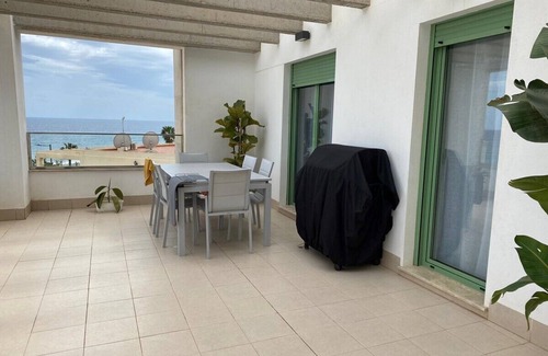 La Parata Apartment | Beachfront apartment with large terrace