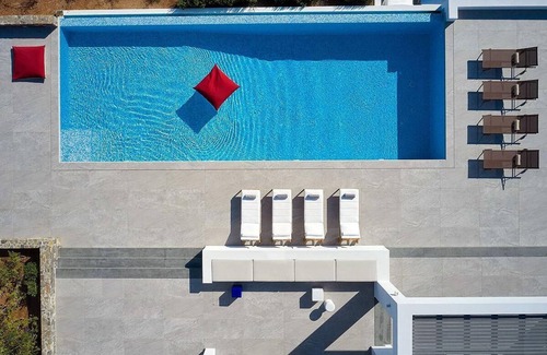 Ammoudara Villa | Beachfront Art Villa with a heated pool