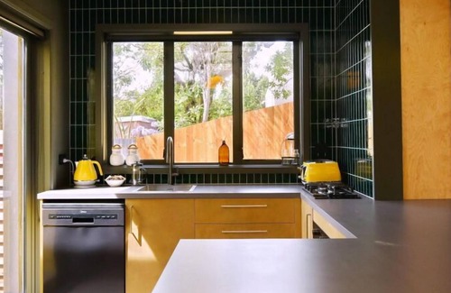 New Brighton Apartment | Beachfront Bach-Beach front Bach with a retro vibe