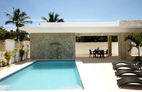 Cabarete Apartment | Beachfront bedroom in cozy villa with pool