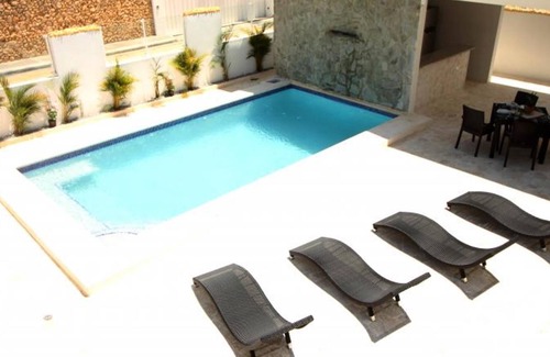 Cabarete Apartment | Beachfront bedroom in cozy villa with pool