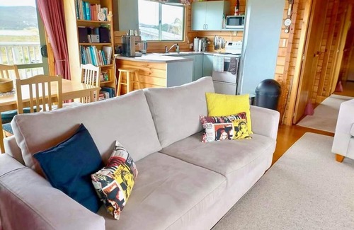 Whangaruru House | Beachfront Bland Bay tranquility with stunning sea views from sun-drenched deck