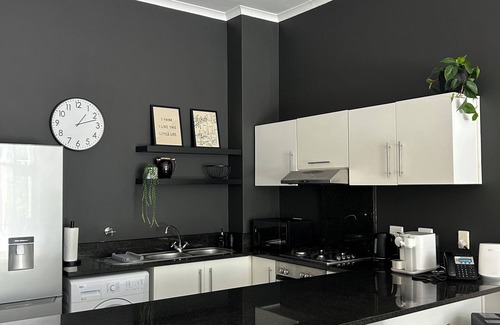 Muizenberg Apartment | Beachfront Bliss at Muizenberg’s Iconic Empire Building