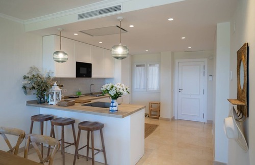 Nikki Beach Apartment | Beachfront complex Neptuno II, sea view, pool and garden, Elviria.