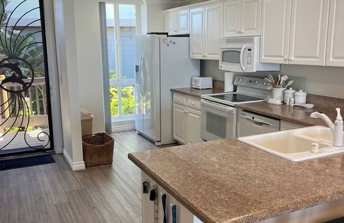 Townsite Condo | BeachFRONT Condo E-18 on the H20! Oceanside, CA - North Coast Village.