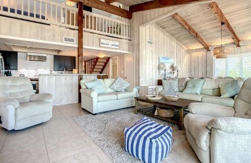 Sea Dunes Apartment | Beachfront Deck with steps down to the white sandy beach Sea Dunes Sandcastle 1A