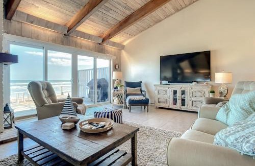 Sea Dunes Apartment | Beachfront Deck with steps down to the white sandy beach Sea Dunes Sandcastle 1A