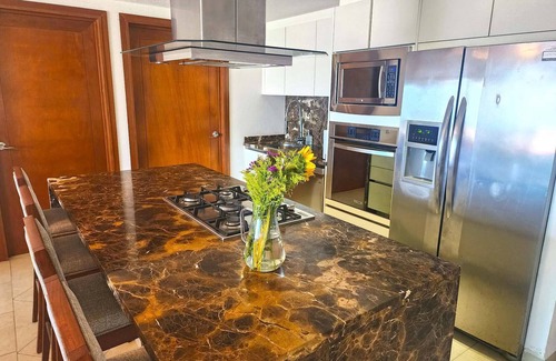 Olimpica Condo | Beachfront Grand Venetian condo