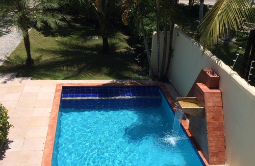 Porto Seguro House | Beachfront house with 4 suites, barbecue and swimming pool in Porto Seguro.