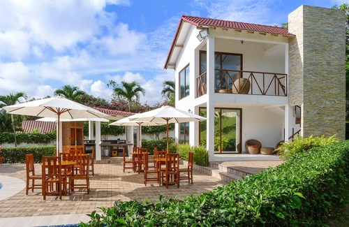 Comuna San Jose Apartment | Beachfront, large Pool, lap pool, & Jacuzzi, Barbecue area, Spectacular Gardens