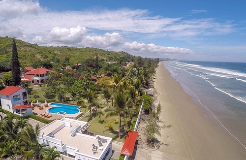 Comuna San Jose Apartment | Beachfront, large Pool, lap pool, & Jacuzzi, Barbecue area, Spectacular Gardens