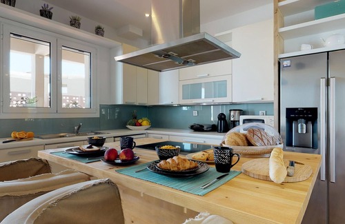 Agii Apostoli Villa | Beachfront luxury villa with hot tub & sunset view