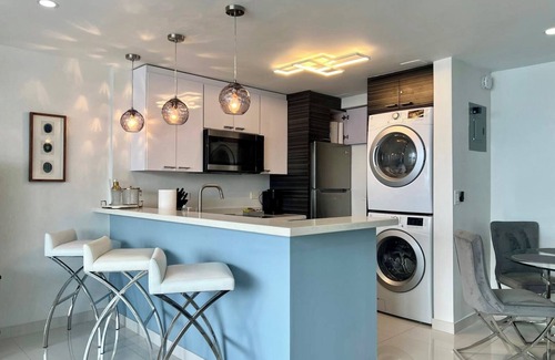 San Juan Apartment | Beachfront Oceanview 1-bedroom condo with balcony, parking, wifi, AC