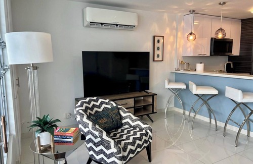 San Juan Apartment | Beachfront Oceanview 1-bedroom condo with balcony, parking, wifi, AC