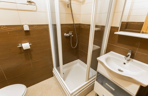 Petrovac Apartment | Beachfront One Bedroom Apartment with balcony and backyard view