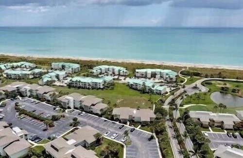 Fort Pierce Condo | Beachfront Paradise, Golf, 4 Heated Pools, tiki bar, Pickleball, Tennis & More!