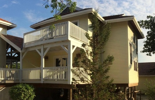 Palmetto Bay Villa | Beachfront, Private Pool, Bar & Restaurant, Dive Shop, Gated Beach Resort.