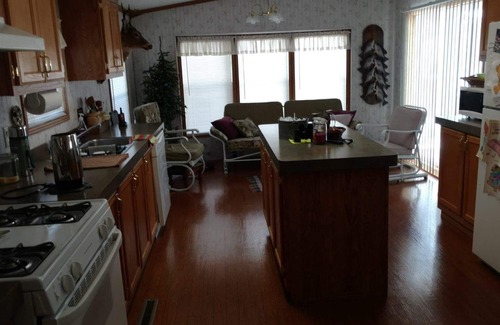 Fountain House | Beachfront retreat on beautiful Tallman lake near HuronManistee National Forest.