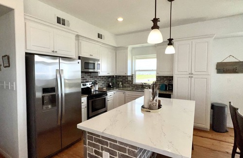Miramar House | Beachfront, sand steps away, pet friendly, large fenced yard
