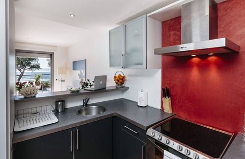 Almadraba-Canyelles Apartment | Beachfront two-bedroom apartment with sea views in Canyelles Petites